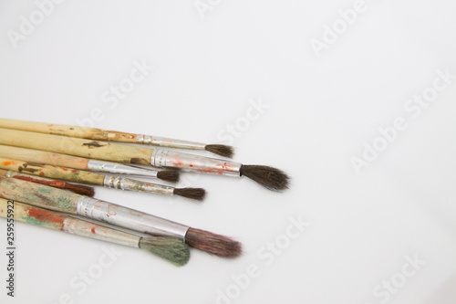 Paint brushes and paints for drawing isolated on white background