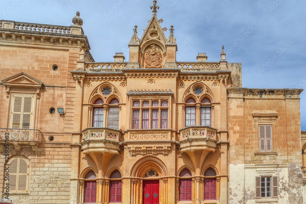 Facade of the house with maltese balconies  in Mdina, Malta