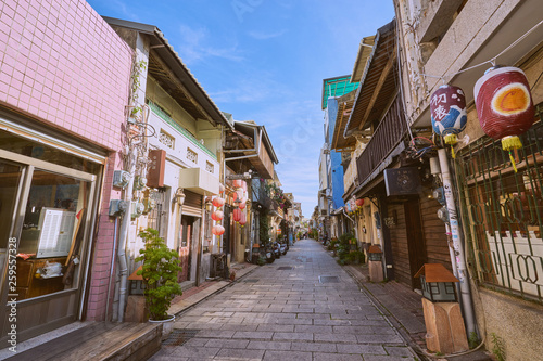 Fototapeta Naklejka Na Ścianę i Meble -  Tainan, Taiwan - December 4, 2018: People walked along the Shennong street, A landmark avenue dating from the Qing Dynasty, lined with quaint, historic shops and homes in Tainan, Taiwan.
