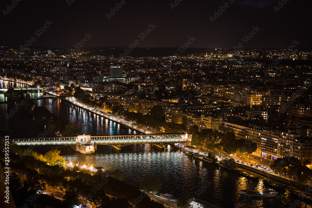 Aerial cityscape of Paris by night - Paris, France