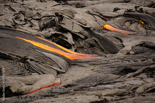 Lava field with new hot flowing lava in Big Island in Hawaii photo