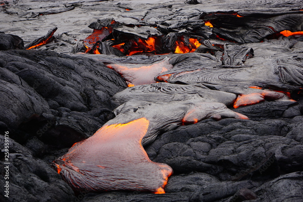 Lava field with new hot flowing lava in Big Island in Hawaii Lava field with new hot flowing lava in Big Island in Hawaii