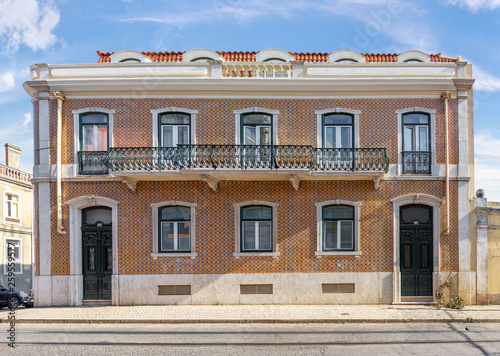 House decorated with traditional azulejo tiles. Lisbon, Portugal