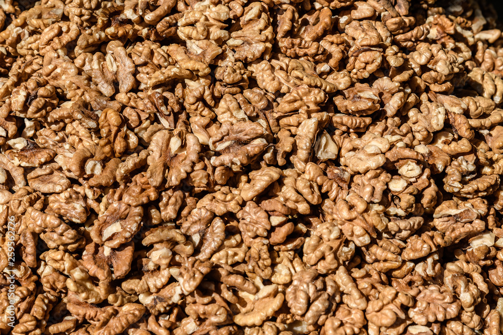Large group of fresh walnut kernels sold at a spice food market, organic food background Large group of fresh walnut kernels sold at a spice food market, organic food background