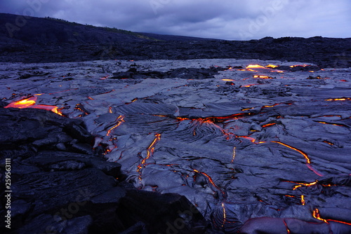 Lava field with new hot flowing lava in Big Island in Hawaii
