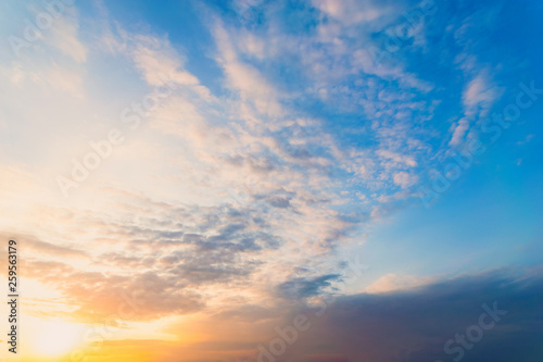 Fototapeta Naklejka Na Ścianę i Meble -  Sky blue and orange light of the sun through the clouds in the sky