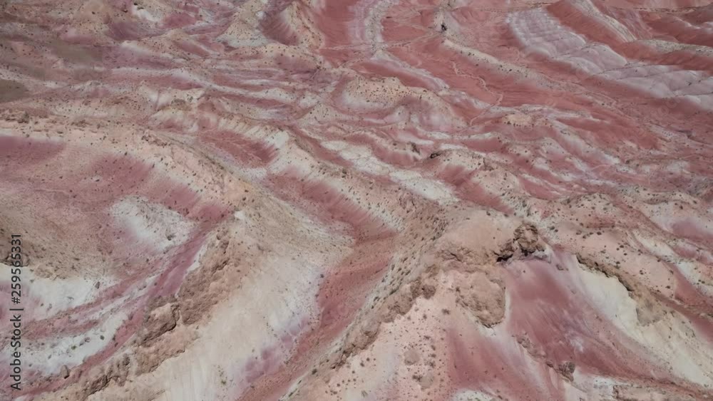 Flying over the red, colorful, rainbow mountains, covered with unique patterns, Iran. Aerial photography. Flying over the red, colorful, rainbow mountains, covered with unique patterns, Iran. Aerial photography.