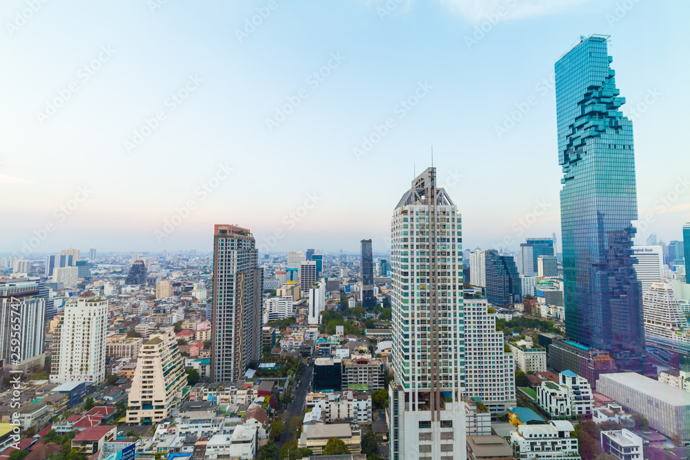 Modern office buillding and condominium sunset sky