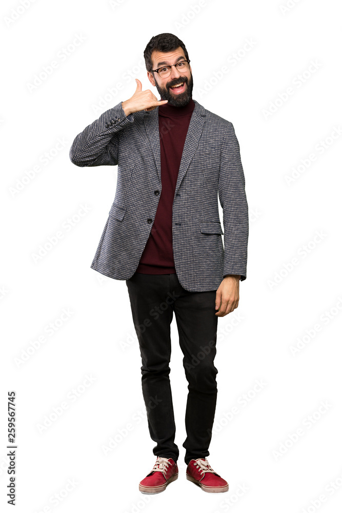 Handsome man with glasses making phone gesture. Call me back sign over isolated white background Handsome man with glasses making phone gesture. Call me back sign over isolated white background