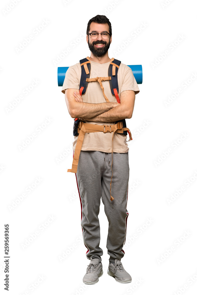 Hiker man with glasses and happy over isolated white background Hiker man with glasses and happy over isolated white background