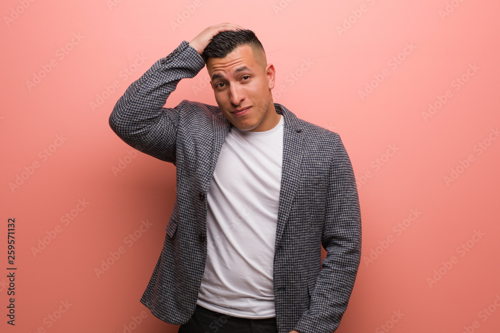 Young elegant latin man worried and overwhelmed Young elegant latin man worried and overwhelmed