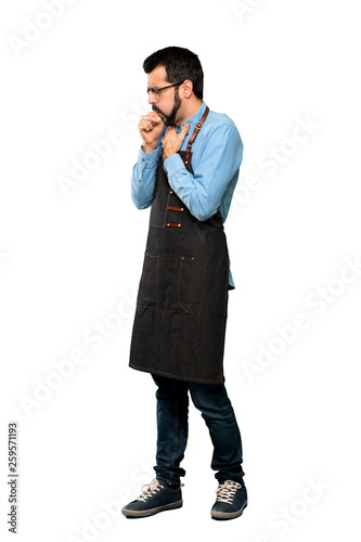 Full-length shot of Man with apron is suffering with cough and feeling bad over isolated white background