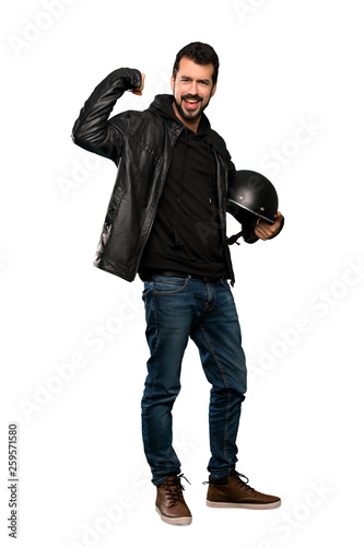 Full-length shot of Biker man doing strong gesture over isolated white background