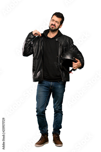 Full-length shot of Biker man with tired and sick expression over isolated white background