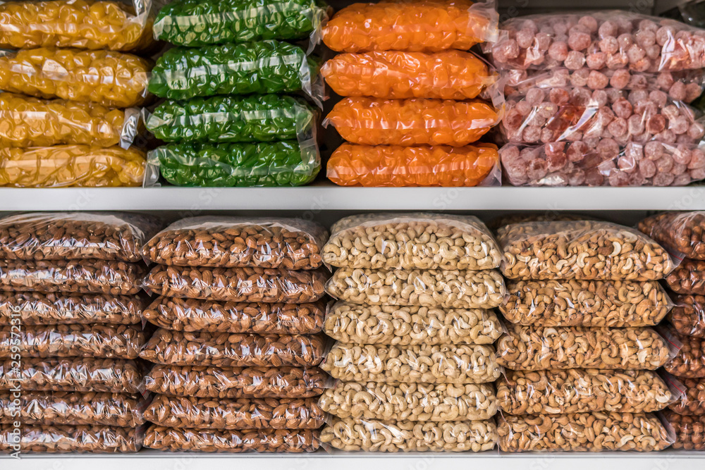 store counter with nuts and dried fruit. sweets in the market. store counter with nuts and dried fruit. sweets in the market.