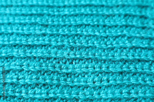 Closed Up Texture of Turquoise Blue Alpaca Knitted Wool Fabric in Horizontal Patterns