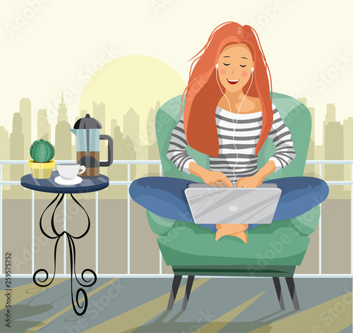 Young female blogger. Freelancer woman using laptop computer sitting on the balcony