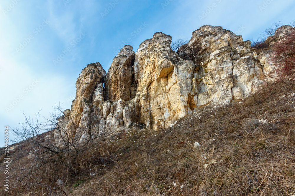 The chalk geological formation among dry grassland. Lisogorka, Rostov-on-Don region, Russia
