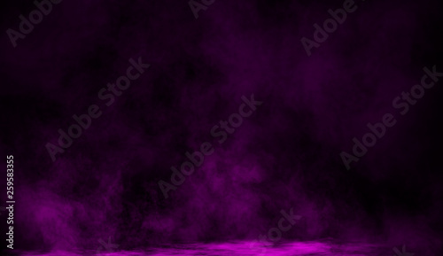 Abstract purple smoke mist fog on a black background. Design element.