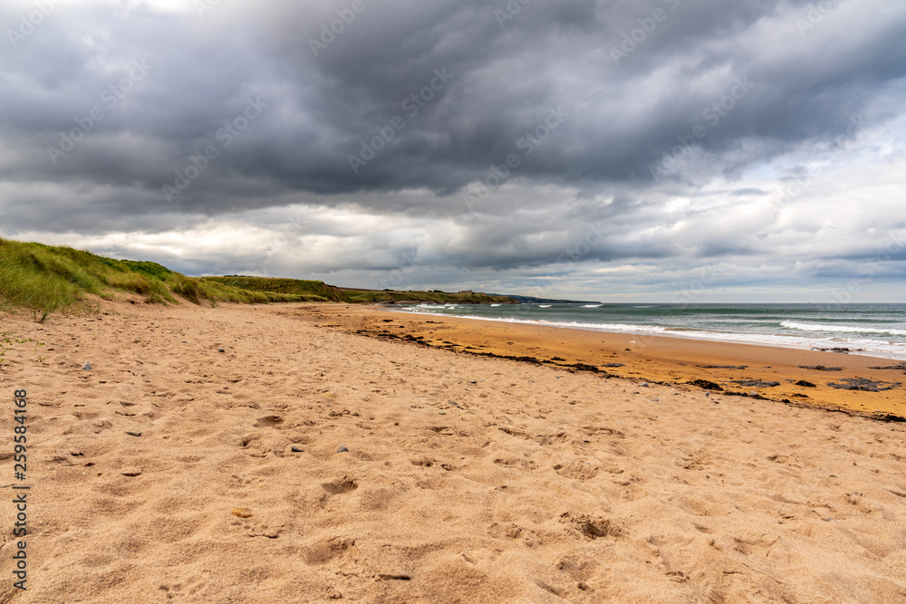 Dramatic sky at Cocklawburn Beach near Berwick-upon-Tweed in Northumberland, England, UK