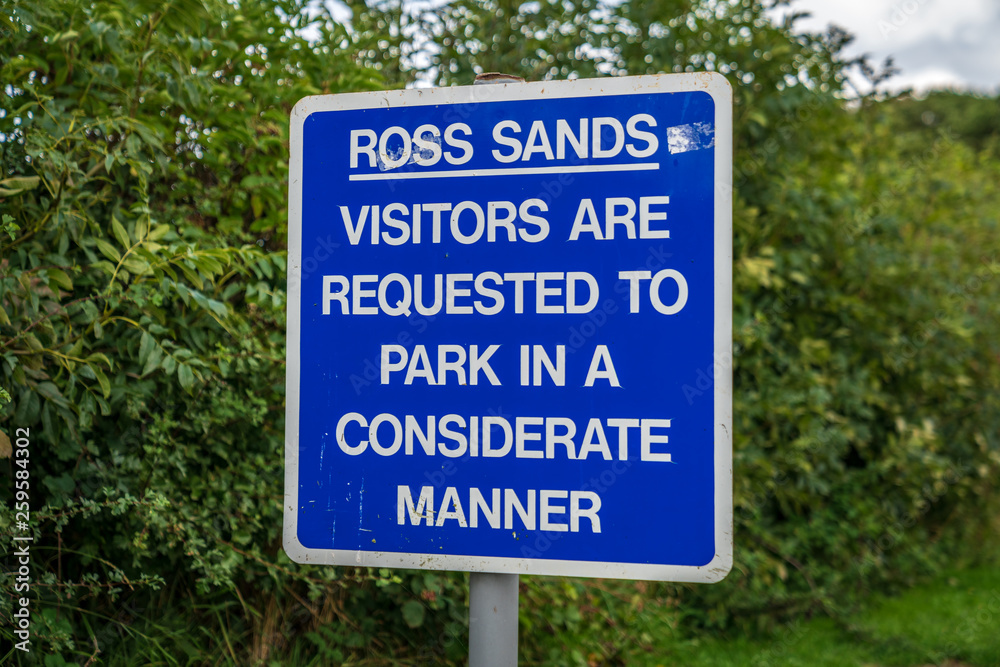 Sign: Ross Sands, Visitors are requested to park in a considerate manner - Seen in Ross Sands, Northumberland, England, UK