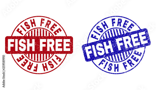 Grunge FISH FREE round stamp seals isolated on a white background. Round seals with grunge texture in red and blue colors. Vector rubber imitation of FISH FREE text inside circle form with stripes.
