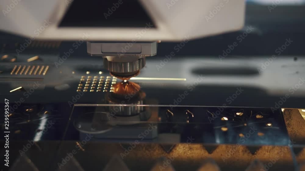 Metalworking CNC milling machine. Cutting metal modern processing technology. laser cutter cuts metal parts.