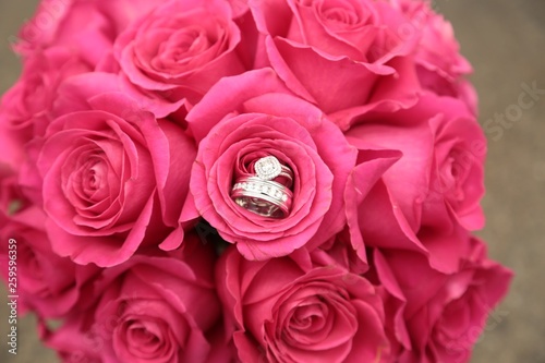 bouquet of pink roses with rings