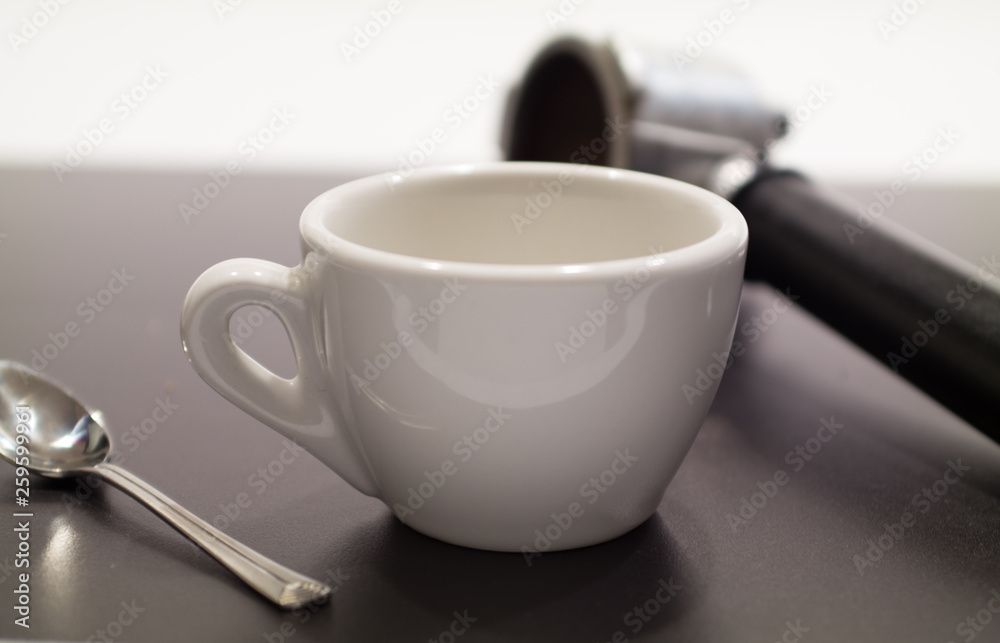 aromatic black coffee and coffee spoon on the table aromatic black coffee and coffee spoon on the table