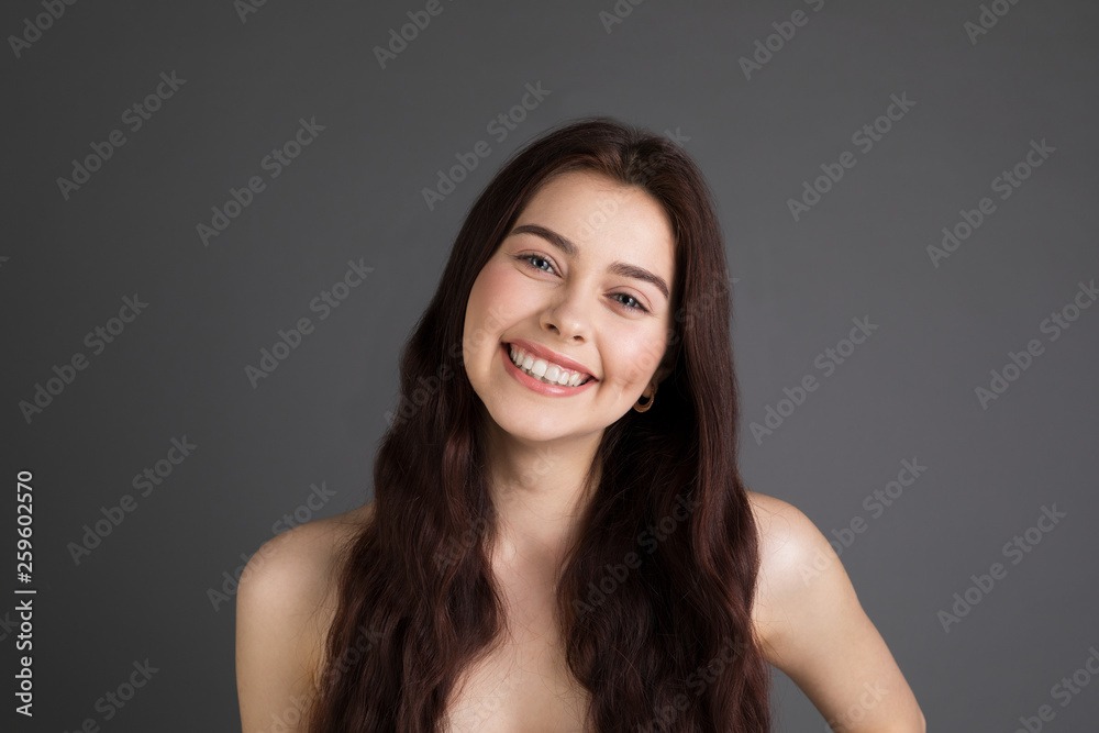 Cheerful positive female youngster with brunette hair Cheerful positive female youngster with brunette hair