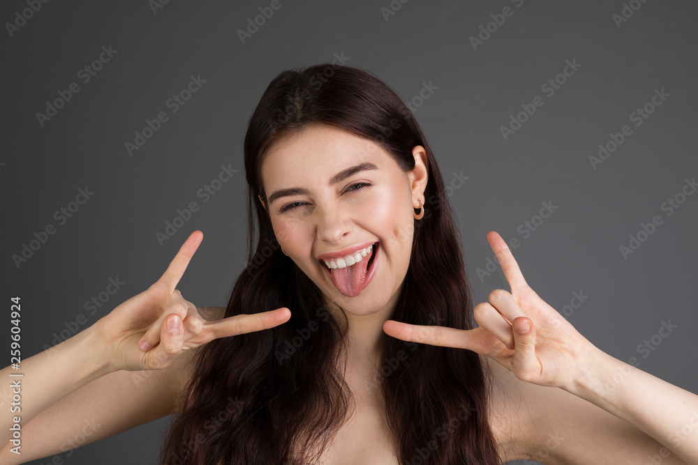 Close up portrait of positive happy european brunette woman