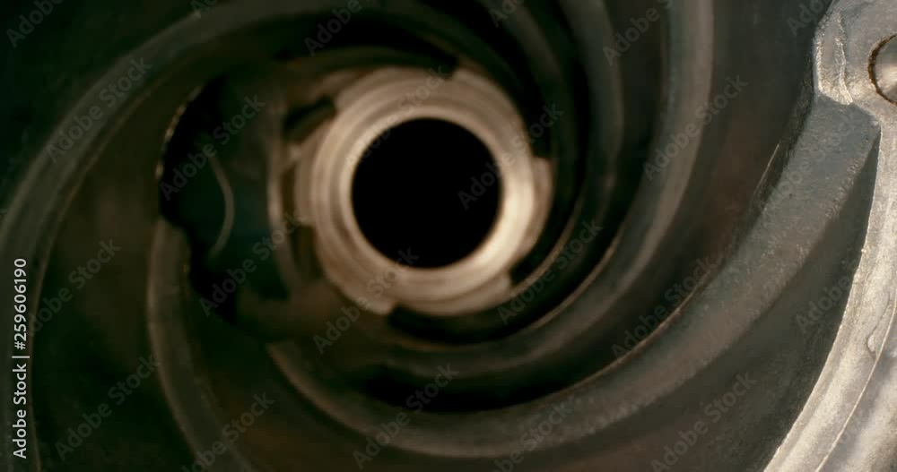 Inside Equipment for Processing. Spiral. Helix, Tunnel. Extreme macro. 4K.