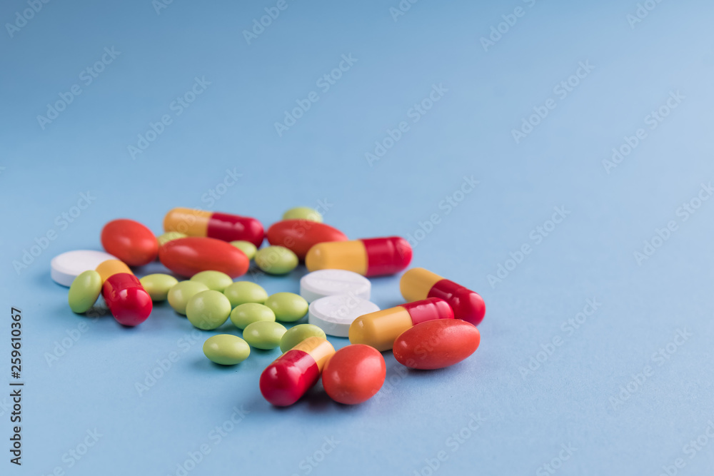 medicines and pills on blue background. medicines and pills on blue background.