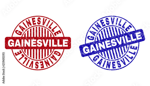 Grunge GAINESVILLE round stamp seals isolated on a white background. Round seals with grunge texture in red and blue colors. Vector rubber imprint of GAINESVILLE text inside circle form with stripes.