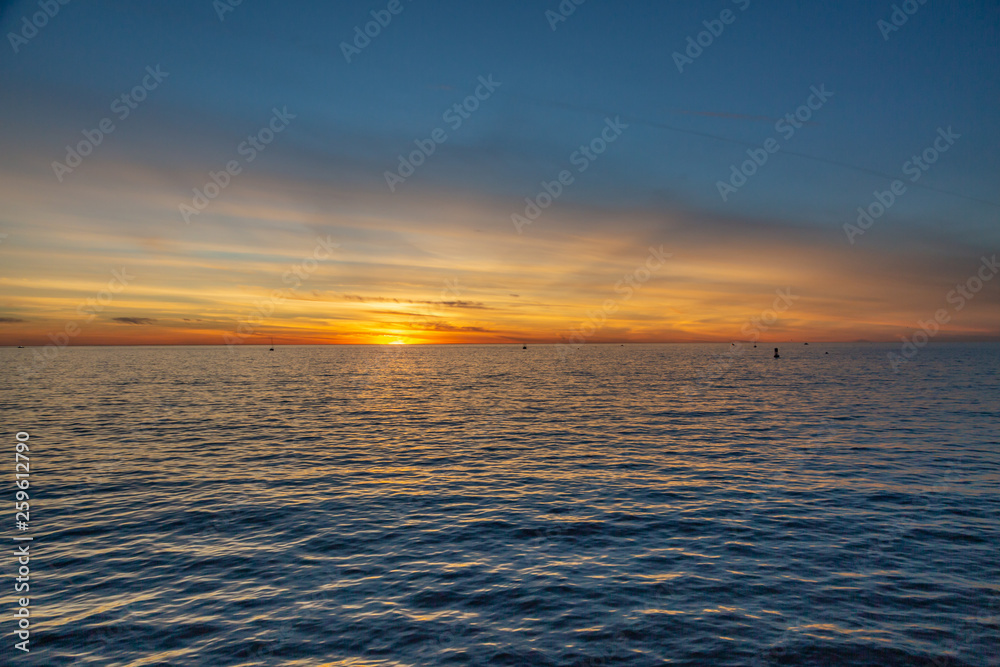 A view out to sea from Redondo Pier, at sunset