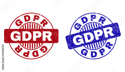 Grunge GDPR round stamp seals isolated on a white background. Round seals with grunge texture in red and blue colors. Vector rubber imprint of GDPR title inside circle form with stripes.