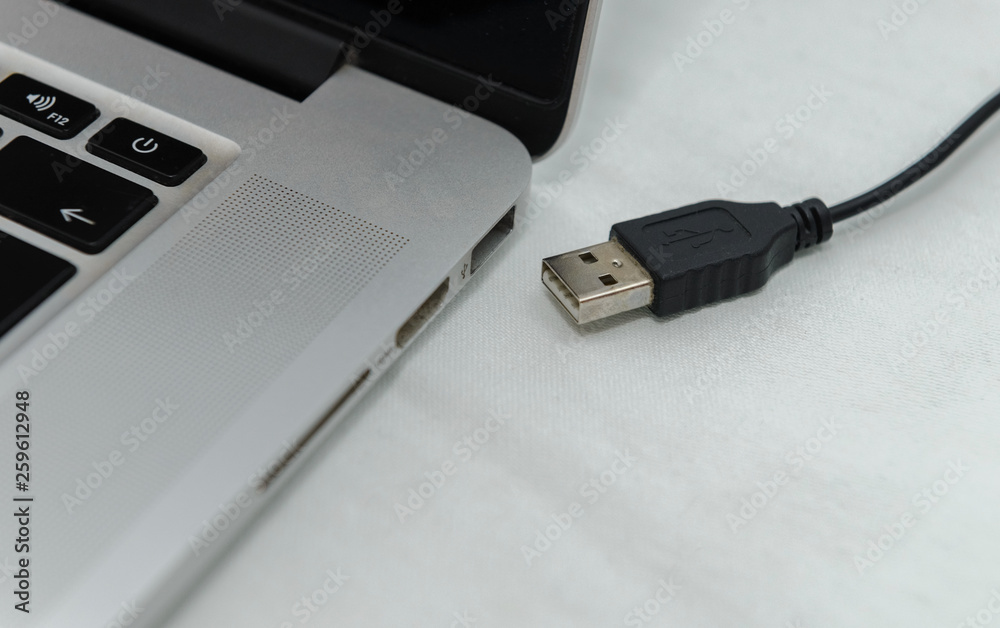 laptop charging cable close up laptop charging cable close up