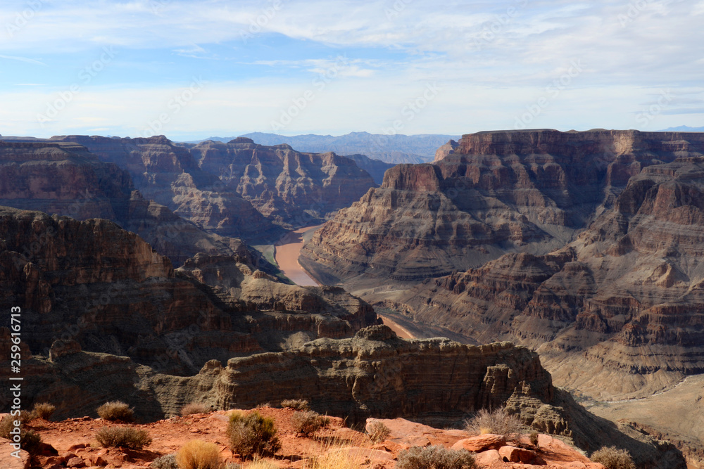 Fototapeta premium The Grand Canyon, carved by the Colorado River in Arizona, United States. Grand Canyon National Park, Grand Canyon West, amazing view of the nature, breathtaking landscape.