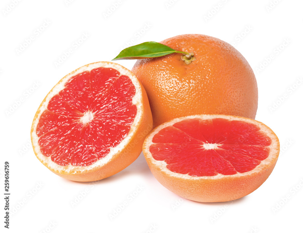 Whole and cut ripe grapefruits isolated on white Whole and cut ripe grapefruits isolated on white
