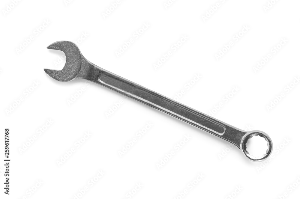New combination wrench on white background, top view. Plumber tools New combination wrench on white background, top view. Plumber tools