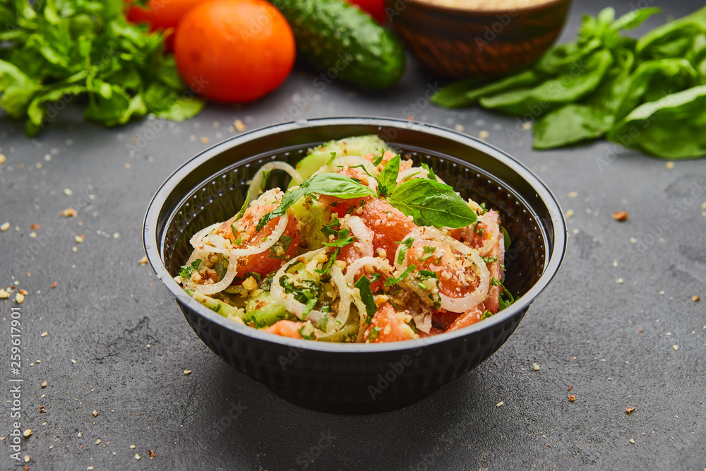 Fresh spring detox mix salad with vegetables such as tomatoes, cucumbers and onion Fresh spring detox mix salad with vegetables such as tomatoes, cucumbers and onion
