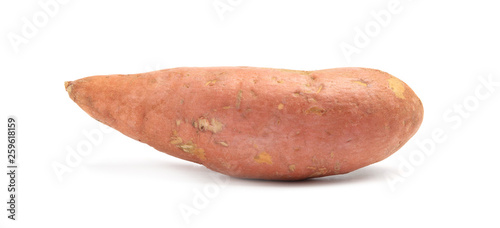 Whole ripe sweet potato on white background