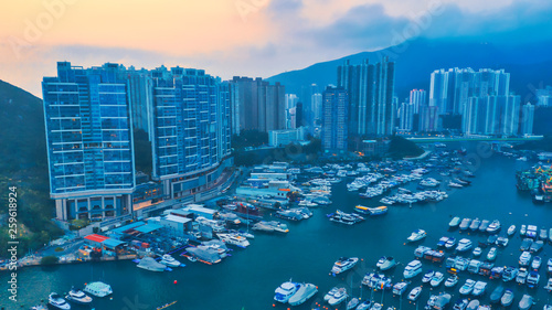 Photography Panoramic view from above of Small fishing boats near the wave barrier in aberde