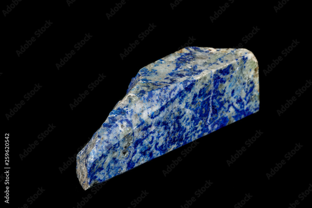 Macro of mineral stone Lazurite on a black background Macro of mineral stone Lazurite on a black background