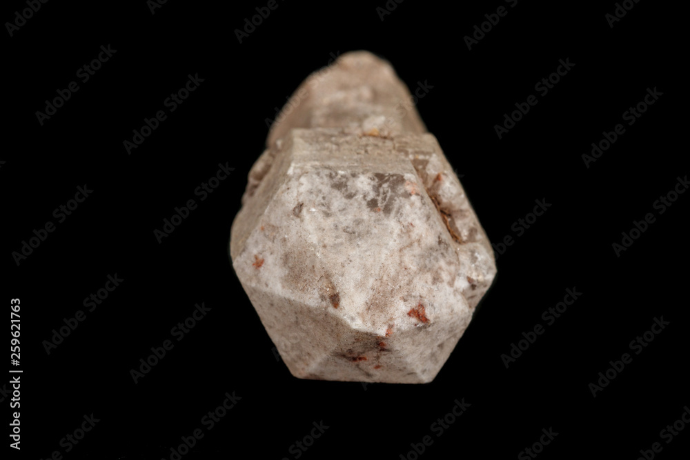 Macro of a stone, a scepter-like quartz mineral on a black background
