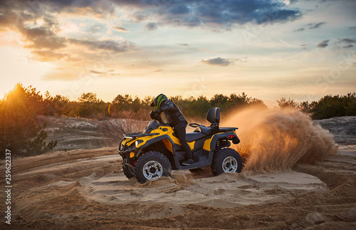 Racing in the sand on a four-wheel drive quad. © trek6500