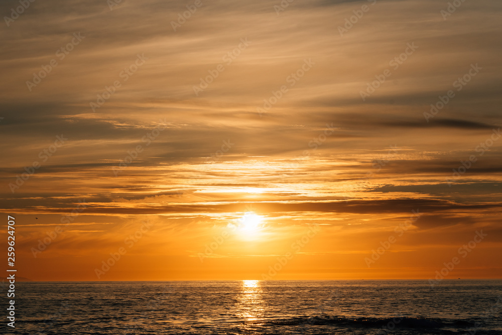 Sunset over the Pacific Ocean, at Victoria Beach in Laguna Beach, Orange County, California