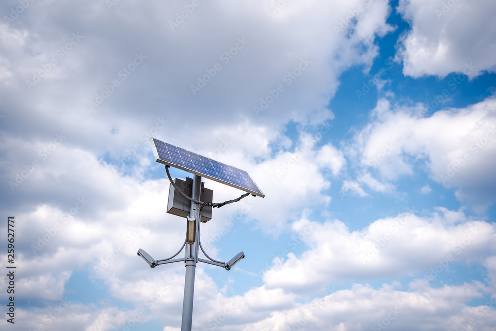 Sunlight collector street lamp and blue sky background. Alternative energy concept. Sunlight collector street lamp and blue sky background. Alternative energy concept.