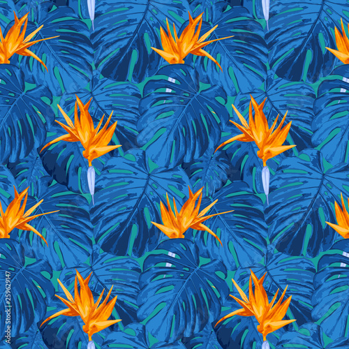 Vector seamless pattern with tropical flowers. Floral background in trendy fantasy colors. Texture with bright blue monstera leaves, foliage, birds of paradise flower, strelitzia. Exotic summer style © Olgastocker