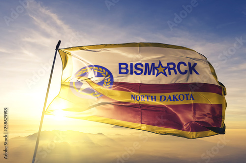 Photos Bismarck city capital of North Dakota flag waving on the top sunrise mist fog